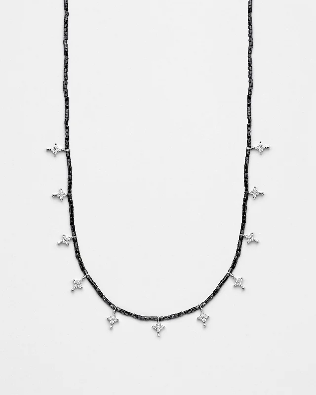 sterling silver chain necklaces for women -Strung Out Black Twinkling Star Necklace