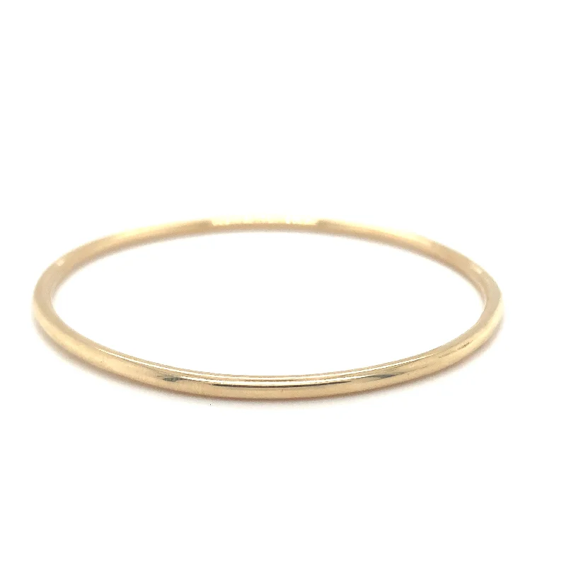 women’s stretch bracelets -Tadgh Óg 9ct Yellow Gold Round Wire Bangle